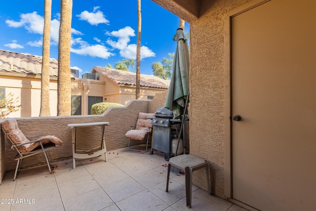 view of patio with a balcony