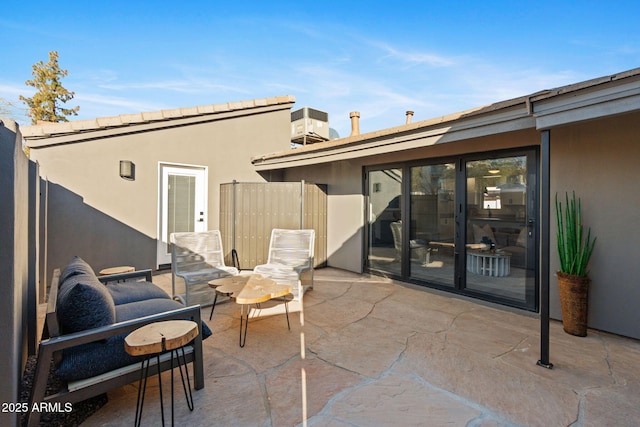 view of patio / terrace with central air condition unit