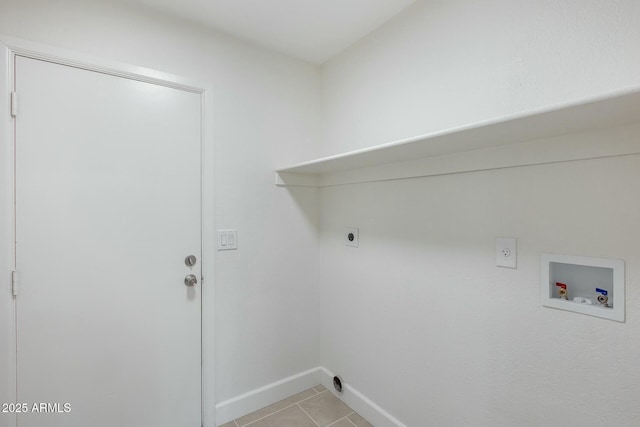 clothes washing area with electric dryer hookup, washer hookup, and light tile patterned floors