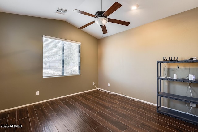 unfurnished room with ceiling fan, dark hardwood / wood-style flooring, and lofted ceiling