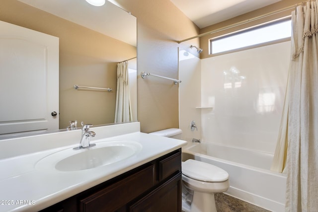 full bathroom with toilet, vanity, and shower / tub combo with curtain