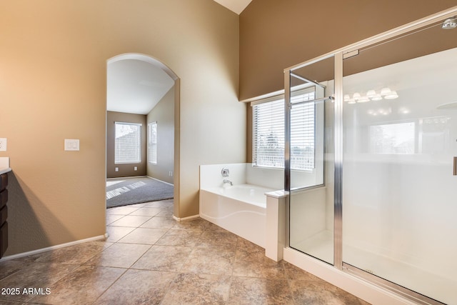 bathroom featuring vanity, tile patterned floors, and independent shower and bath