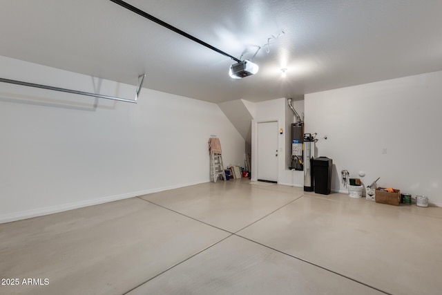 garage with gas water heater and a garage door opener