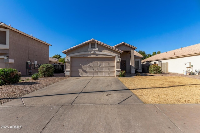 ranch-style home with a garage