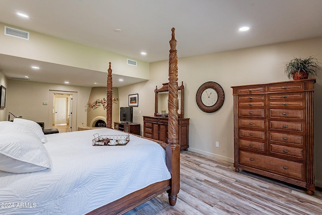 bedroom featuring light hardwood / wood-style floors