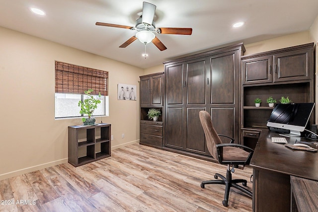 office area featuring light hardwood / wood-style floors and ceiling fan