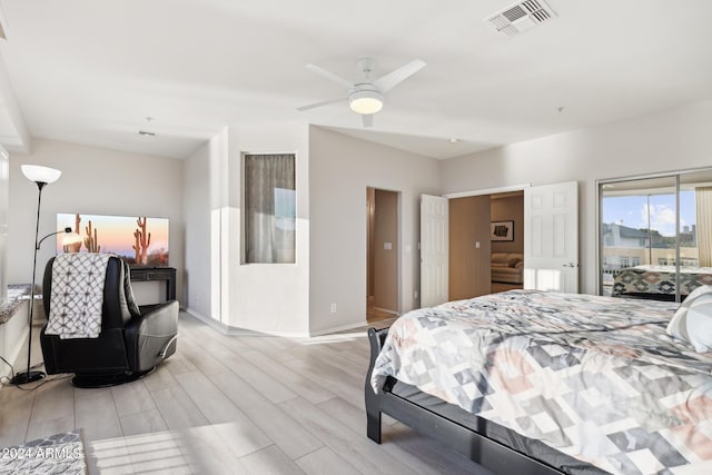 bedroom with ceiling fan, access to exterior, and light hardwood / wood-style flooring