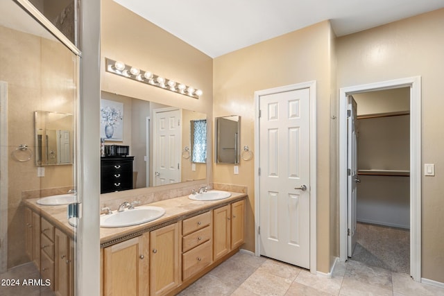 bathroom featuring vanity and tile patterned floors