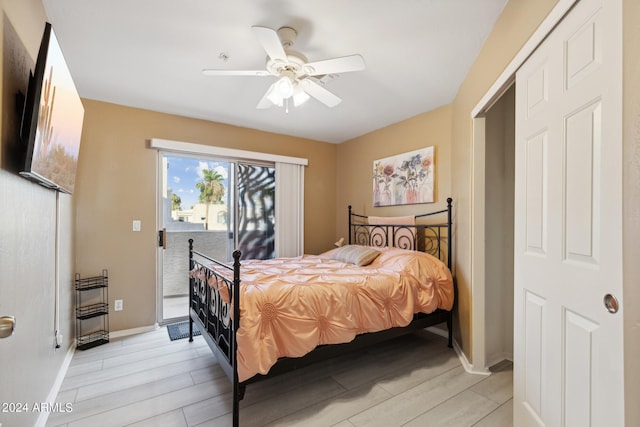 bedroom featuring access to exterior, ceiling fan, and light hardwood / wood-style floors