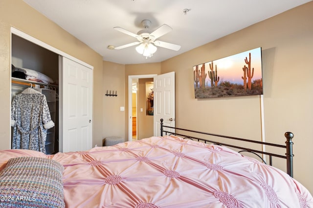 bedroom featuring ceiling fan and a closet