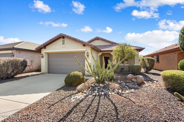 view of front of property featuring a garage