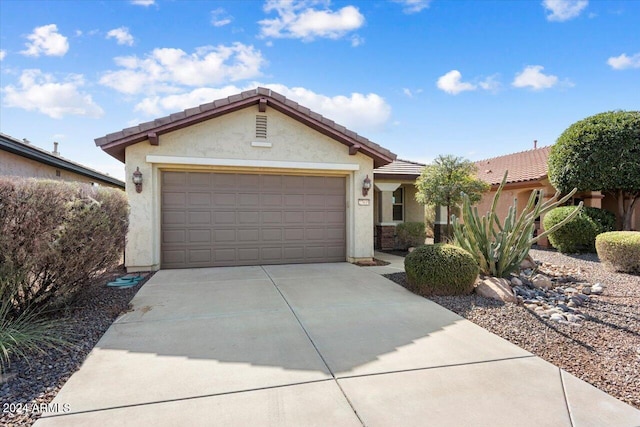 single story home featuring a garage