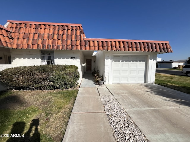 view of front of house with a garage