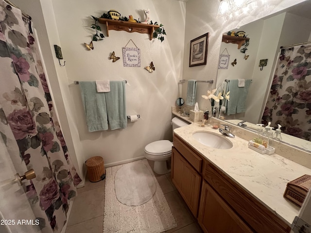 bathroom with vanity, tile patterned flooring, toilet, and a shower with shower curtain