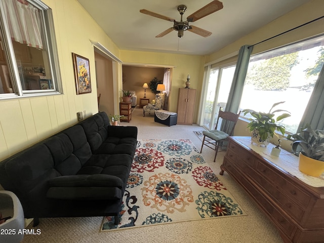 living room featuring ceiling fan