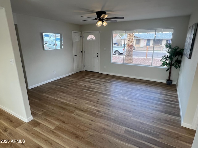 1545 W Marco Polo Rd, Phoenix, AZ 85027 - foyer entrance with ceiling fan, baseboards, and wood finished floors