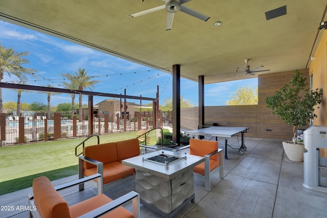 10006 E Rotation Dr, Mesa, AZ 85212 - view of patio / terrace featuring ceiling fan and an outdoor living space with a fire pit