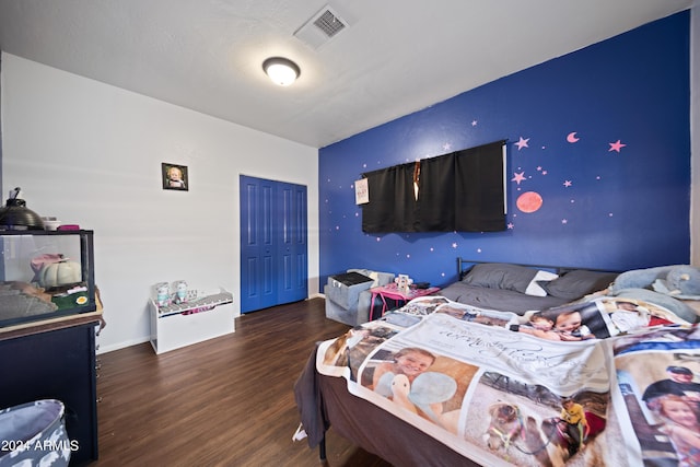 bedroom featuring hardwood / wood-style floors