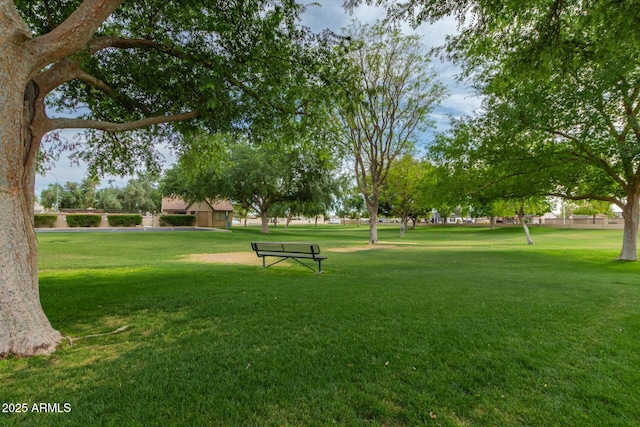 view of home's community featuring a lawn