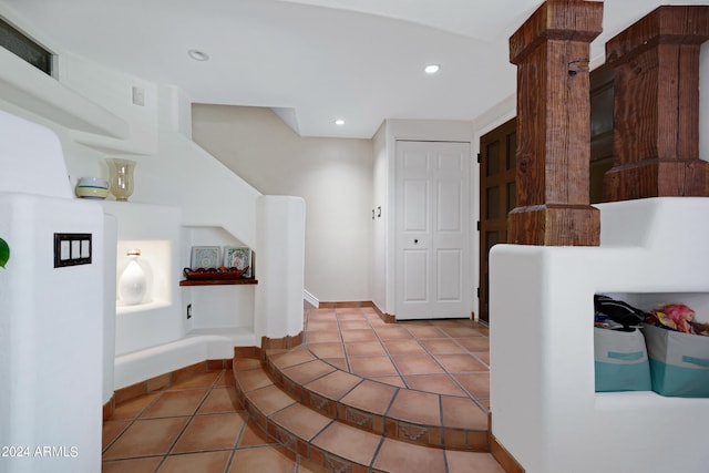 interior space featuring light tile floors