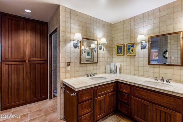 25002 N Quail Haven Dr, Rio Verde, AZ 85263 - full bath with tile walls, double vanity, toilet, and tasteful backsplash