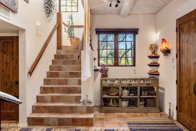 25002 N Quail Haven Dr, Rio Verde, AZ 85263 - stairs featuring wood ceiling with exposed beams
