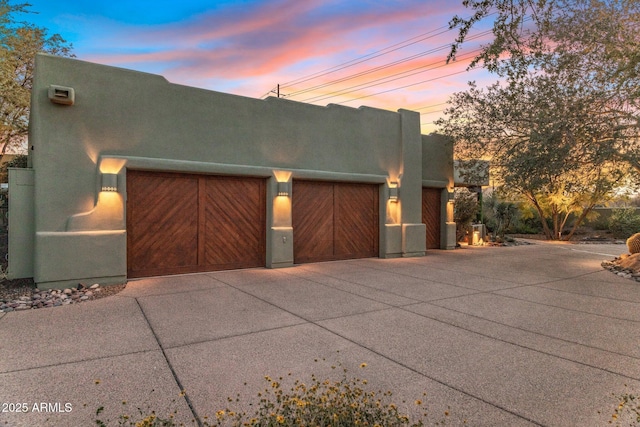 25002 N Quail Haven Dr, Rio Verde, AZ 85263 - view of front facade with stucco siding, a garage, and driveway