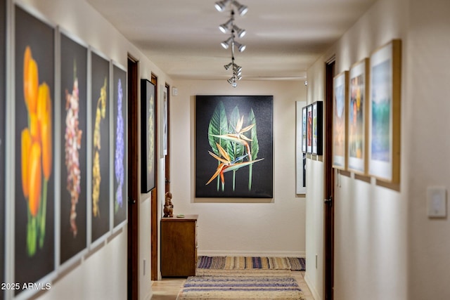 25002 N Quail Haven Dr, Rio Verde, AZ 85263 - hallway featuring track lighting, baseboards, and wood finished floors