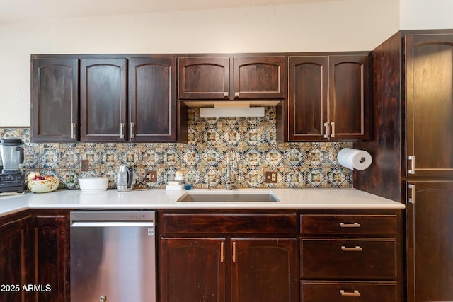 kitchen with a sink, light countertops, dark brown cabinetry, and backsplash