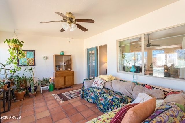 tiled living area featuring ceiling fan