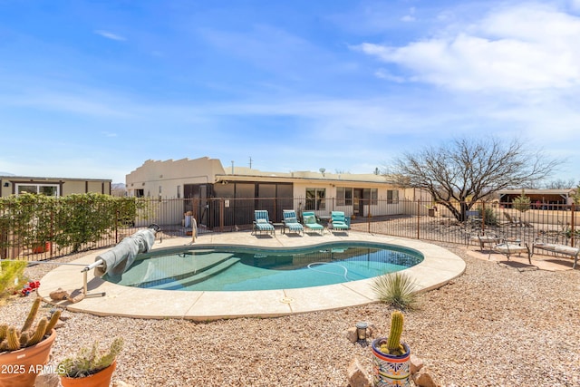 view of pool with fence, a patio area, and a fenced in pool