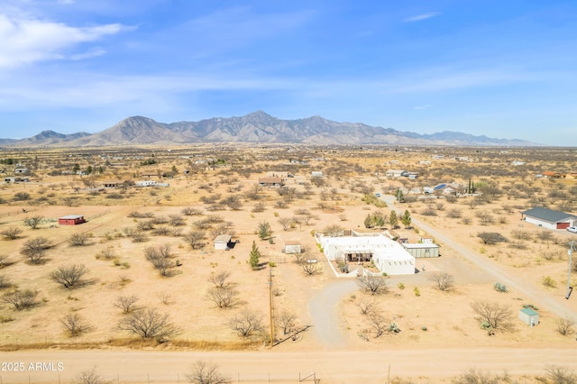 exterior space with a rural view and view of desert