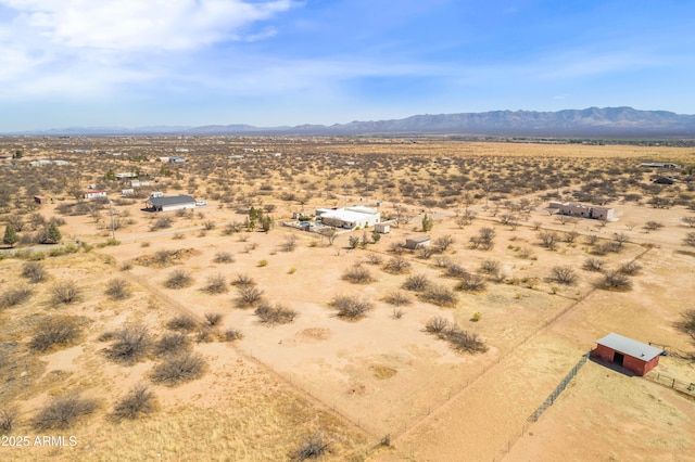 birds eye view of property with a mountain view, a rural view, and view of desert
