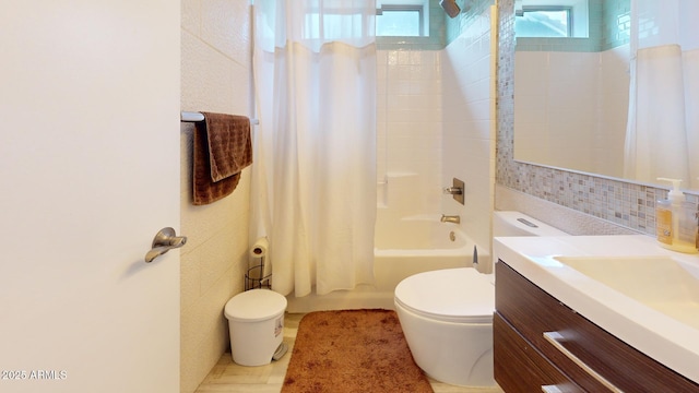 full bathroom with backsplash, vanity, shower / bathtub combination with curtain, tile walls, and toilet