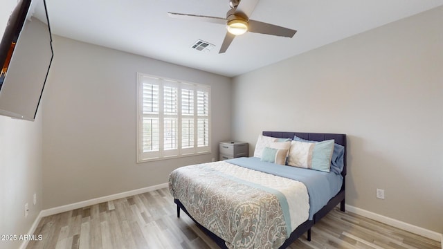 bedroom featuring wood-type flooring and ceiling fan