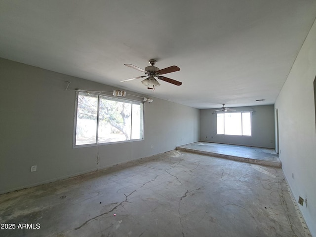 spare room featuring ceiling fan