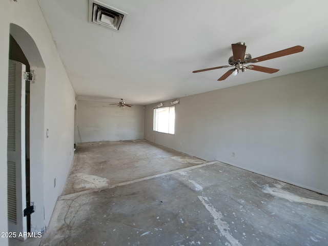 unfurnished room with visible vents