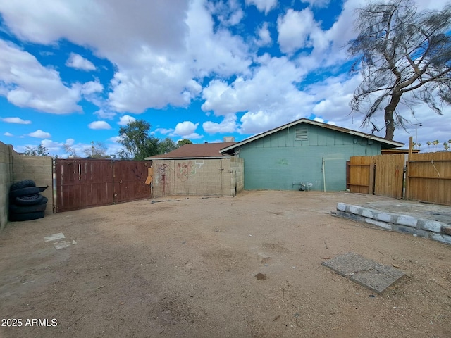 view of home's exterior with fence