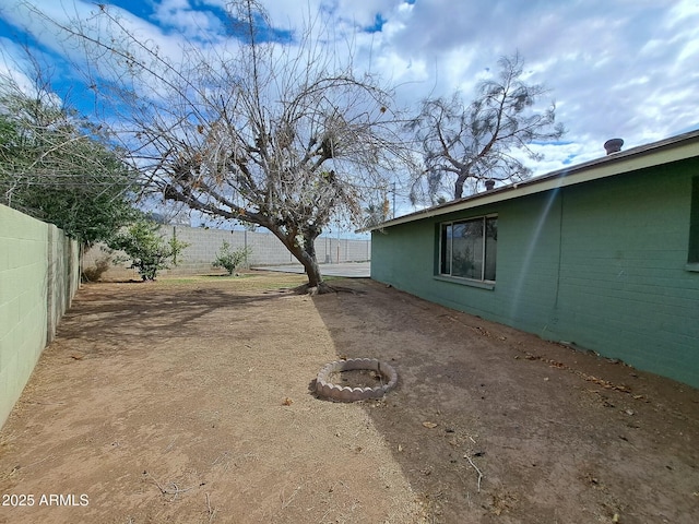 view of yard featuring a fenced backyard