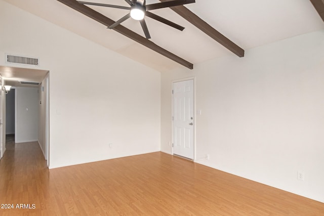 spare room featuring ceiling fan, hardwood / wood-style flooring, high vaulted ceiling, and beam ceiling