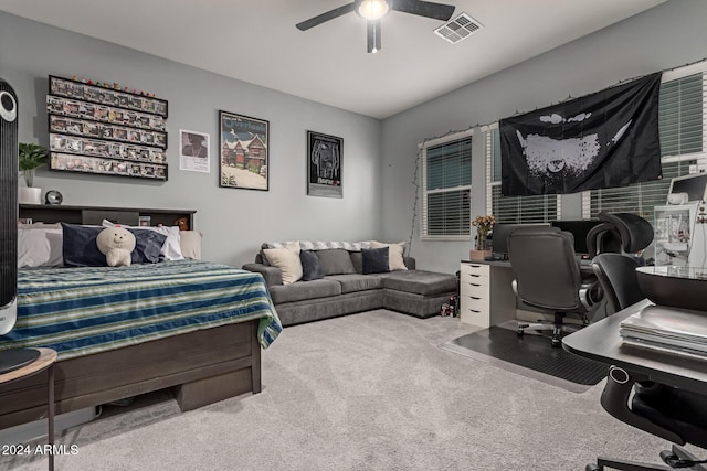 carpeted bedroom with ceiling fan