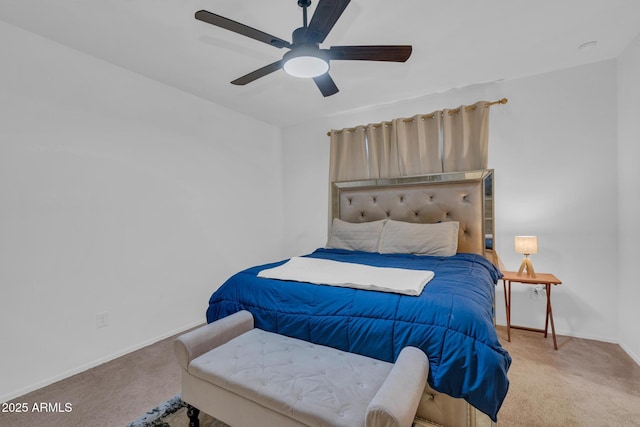 bedroom featuring baseboards, carpet floors, and ceiling fan