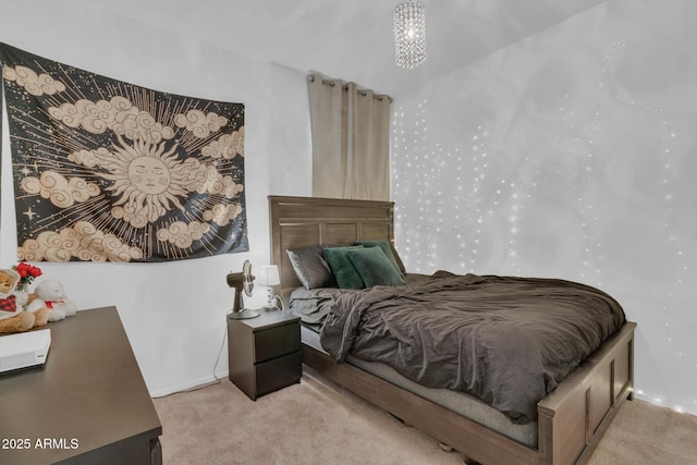 carpeted bedroom featuring baseboards