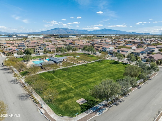 drone / aerial view featuring a mountain view and a residential view