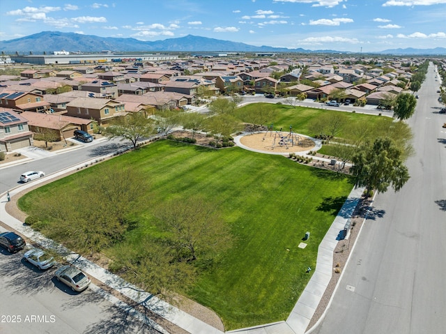 drone / aerial view featuring a mountain view and a residential view