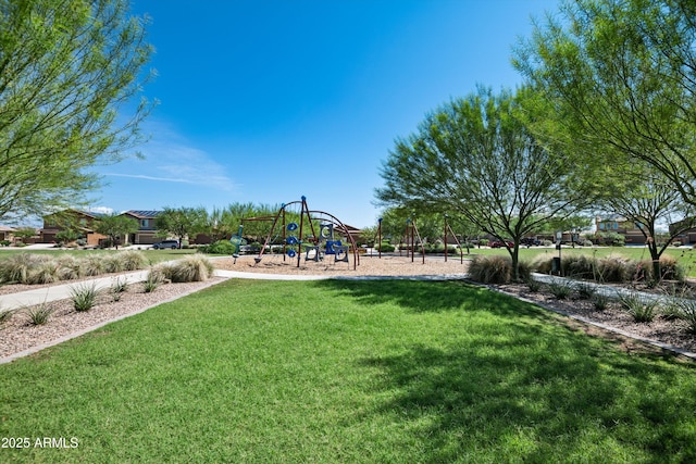 community play area with a lawn