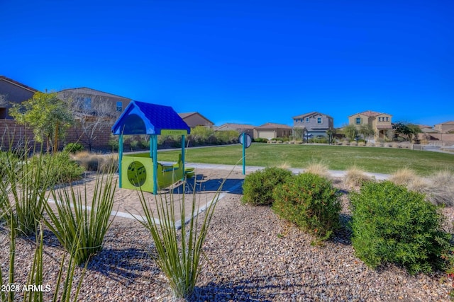 view of jungle gym featuring a yard