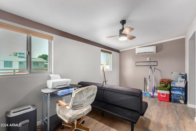 home office featuring an AC wall unit, ceiling fan, hardwood / wood-style floors, and crown molding