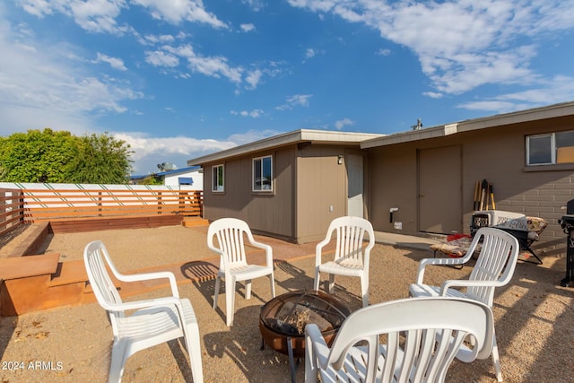 view of patio featuring a fire pit