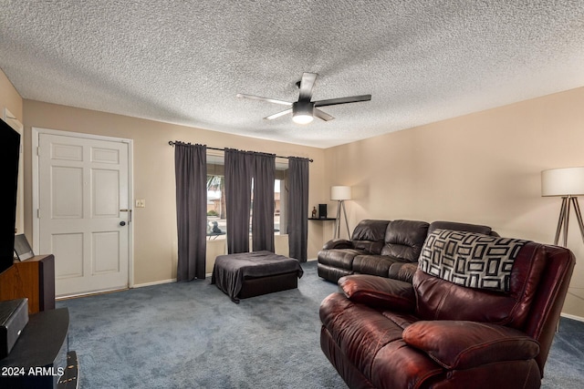 carpeted living room featuring a textured ceiling and ceiling fan